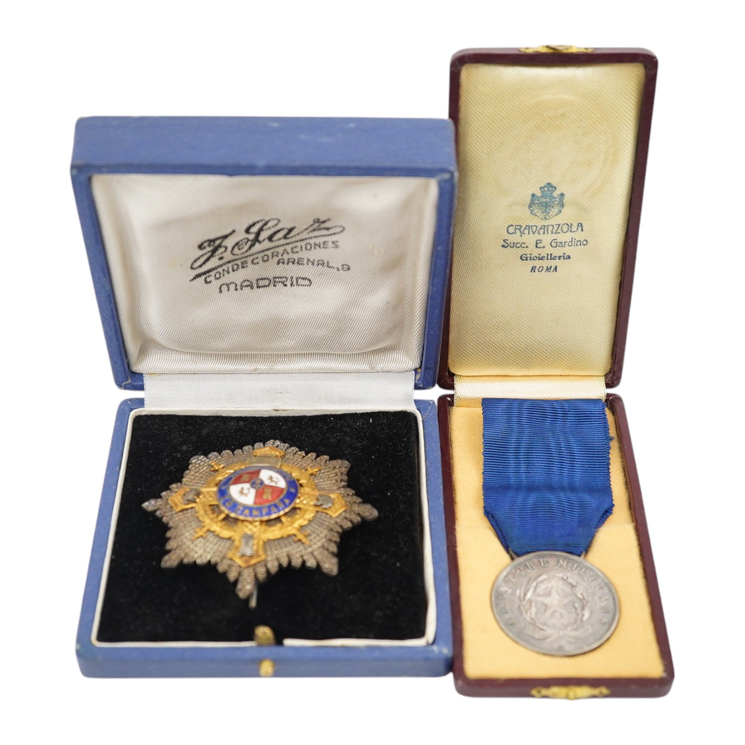 Two cased World War II medals; a Spanish 'Grand Cross of Al Merito En Campana', ('Order of Merit in the Campaign') breast star and an Italian medal of military valour, inscribed and dated 1943. Condition - fair to good.